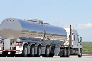 huge-truck-transporting-fresh-milk-picture-id172437105